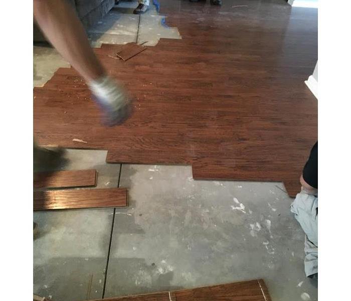 Water damage on hardwood flooring 